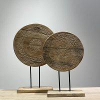 Carved timber disc on stand small and large iMG1